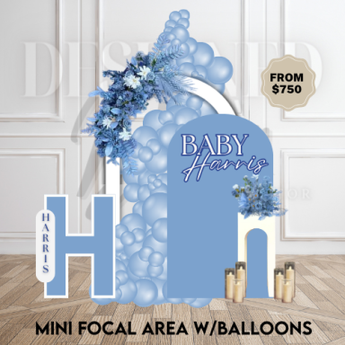 Compact balloon focal area with a backdrop and minimal props for small-space events
