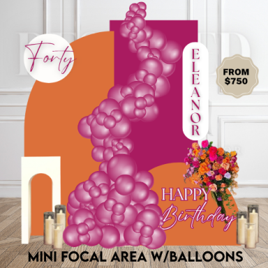 Compact balloon focal area with a backdrop and minimal props for small-space events
